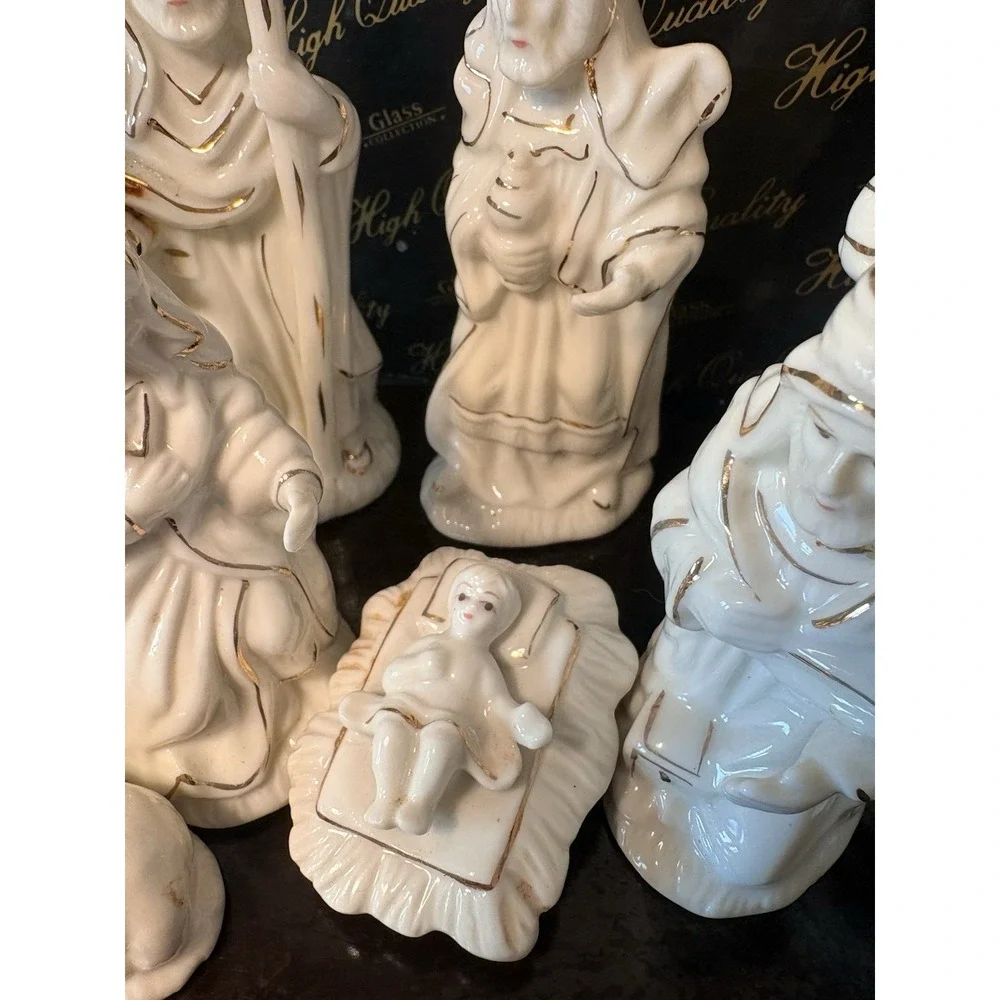 Collectible 9 pc. porcelain Nativity Set with With Wood Base